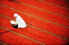 a-muslim-woman-prays-at-the-istiqlal-mosque-on-the-first-day-of-the-holy-fasting-month-of-ramada.jpg