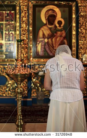 stockphotoprayingwomaninchurchbeforeanic-1.jpg