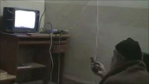 _52601723_binladenwatching-1.jpg