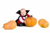 10966339littlebabyboysittinginblackhallo-1.jpg