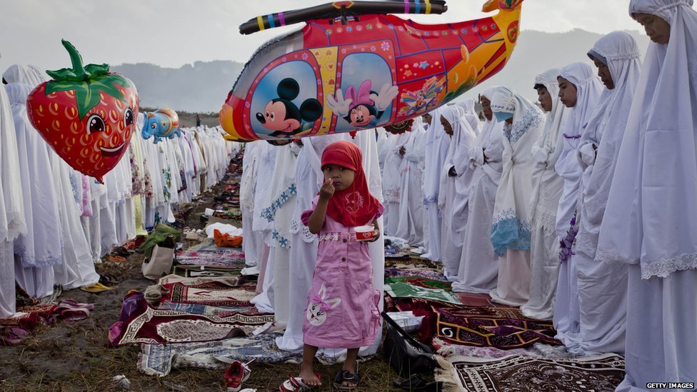  69172588 69172587 1 - In pictures: Eid al-Fitr 2013