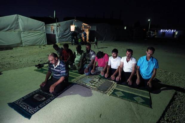 XBH112 Mideast Lebanon Syria RamadanJPG 1 - In pictures: Ramadhan 2014 around the world